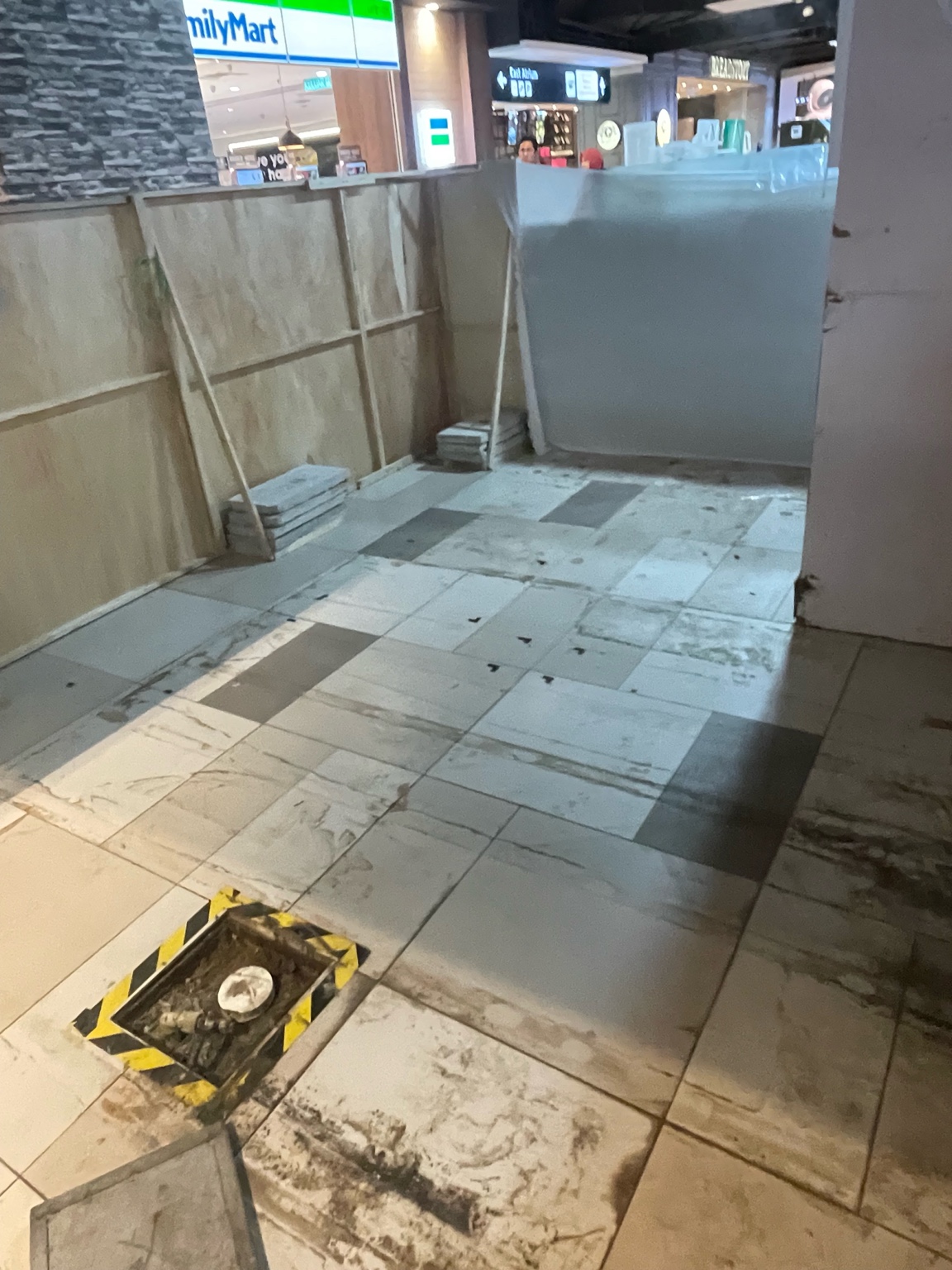 Shopping mall floor tiling project by A.S.B Home Renovation
